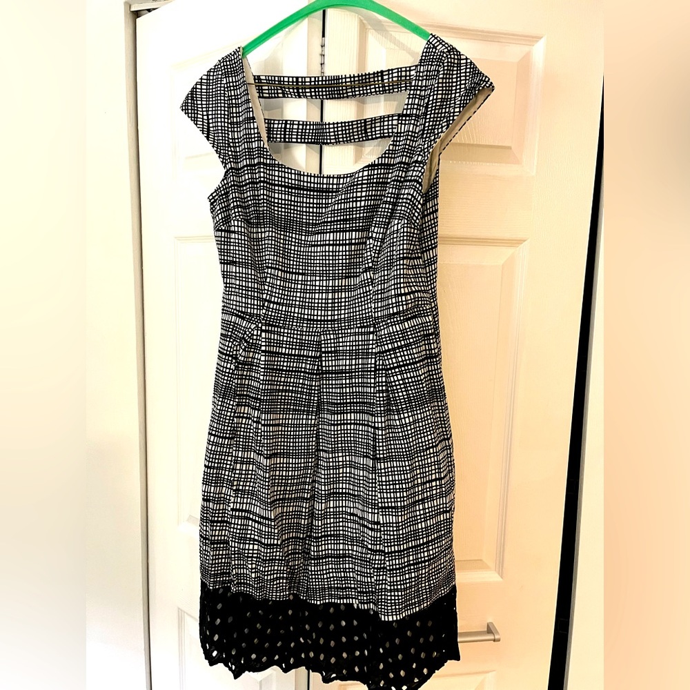Black and white dress with black lace at the bottom